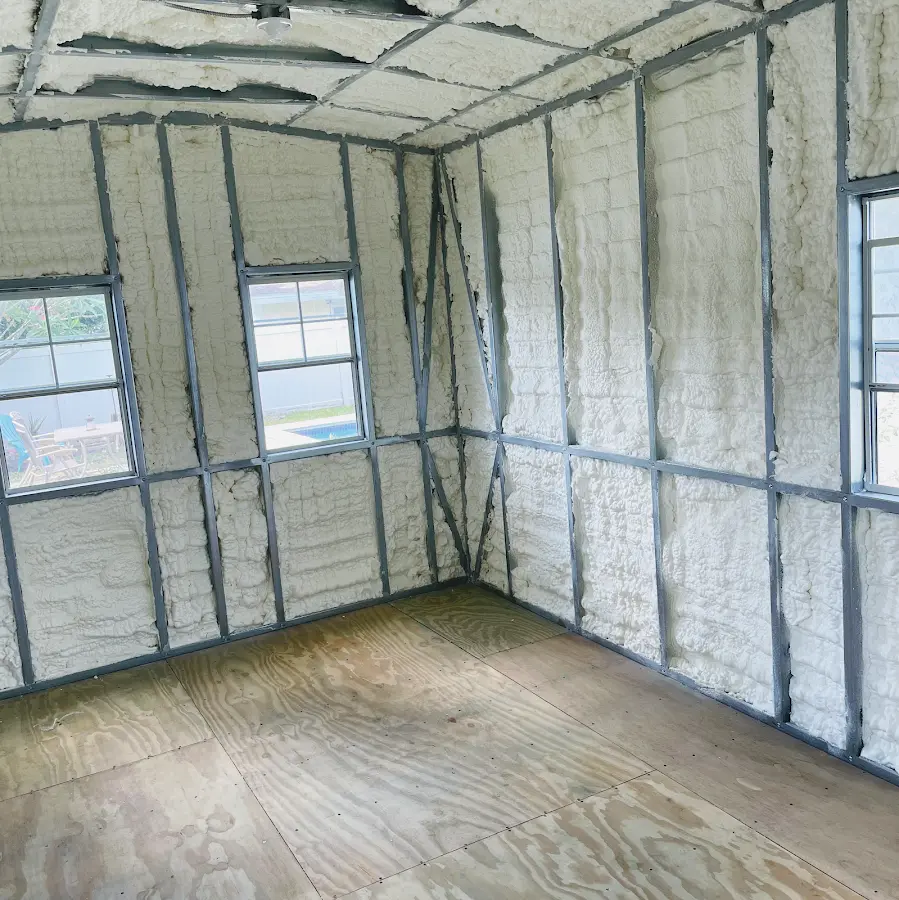 Closed-cell spray foam insulation applied to wall cavities in a residential project in Milwaukie